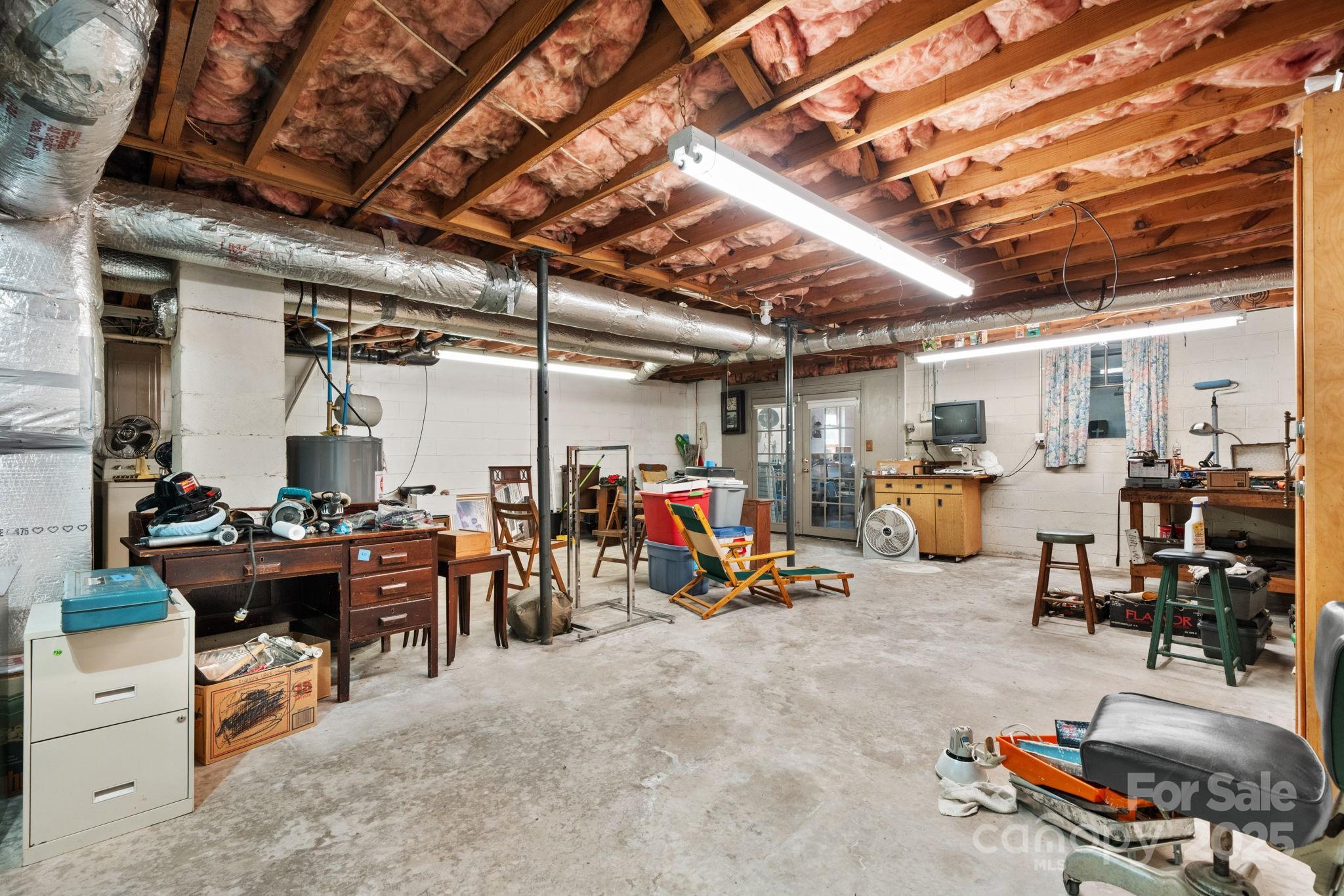 1515 Fairway Acres Road Lenoir, NC 28645 - Photo 25 of 35 a view of a big room with gym equipment