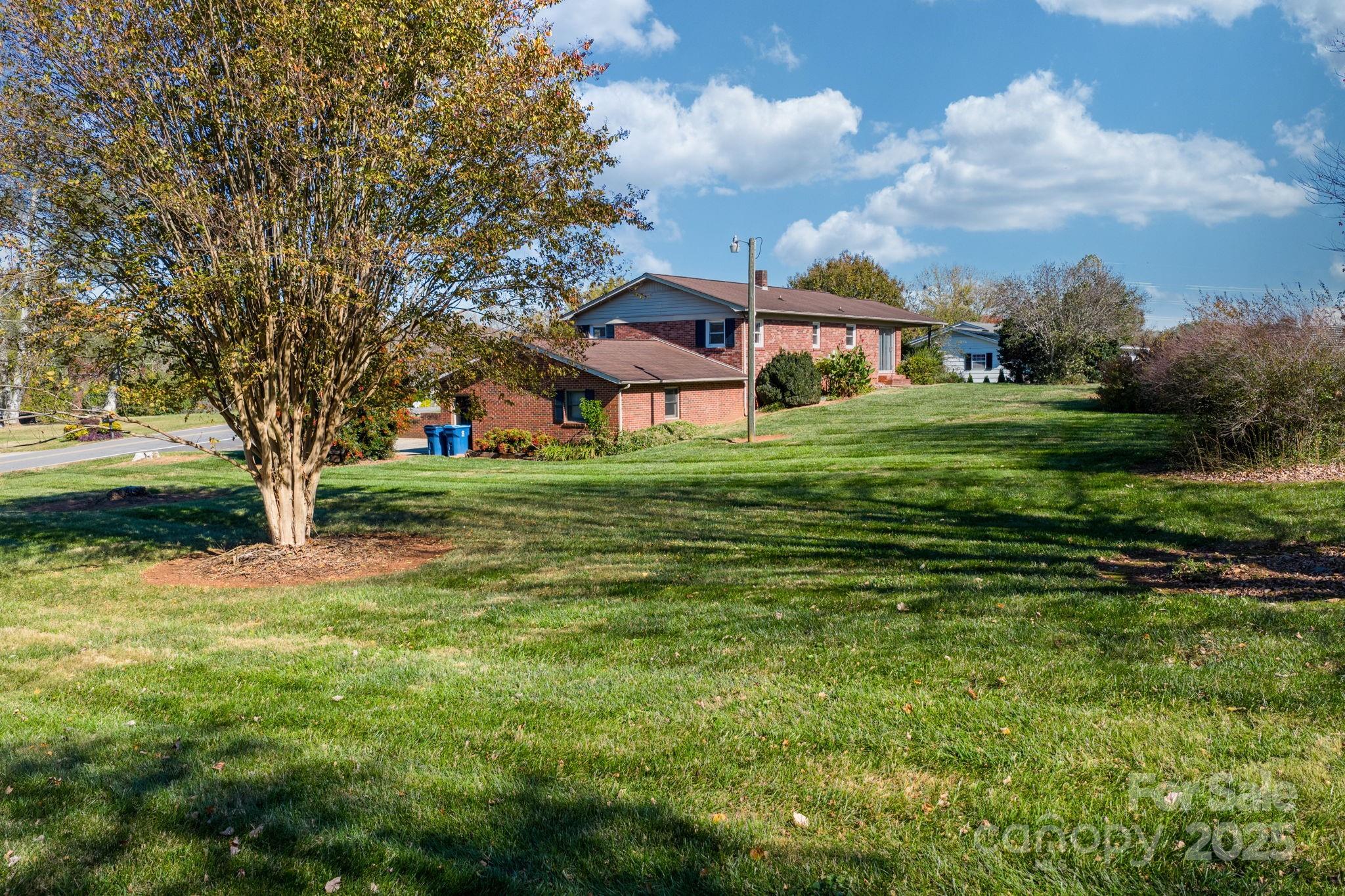 1515 Fairway Acres Road Lenoir, NC 28645 - Photo 30 of 35 a front view of a house with a yard
