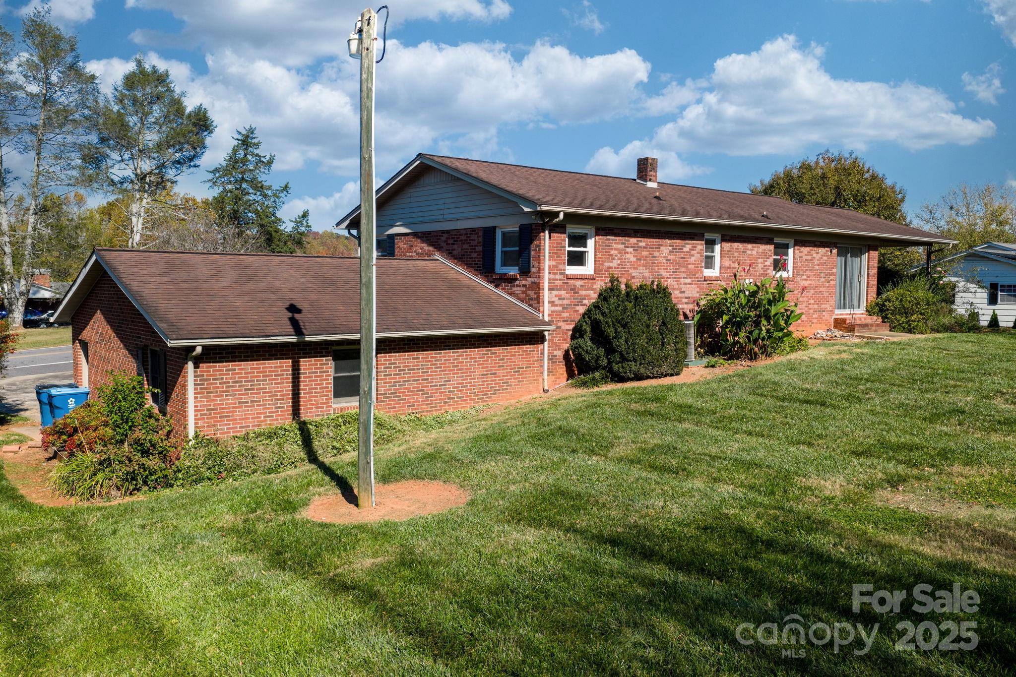 1515 Fairway Acres Road Lenoir, NC 28645 - Photo 31 of 35 a front view of a house with a yard