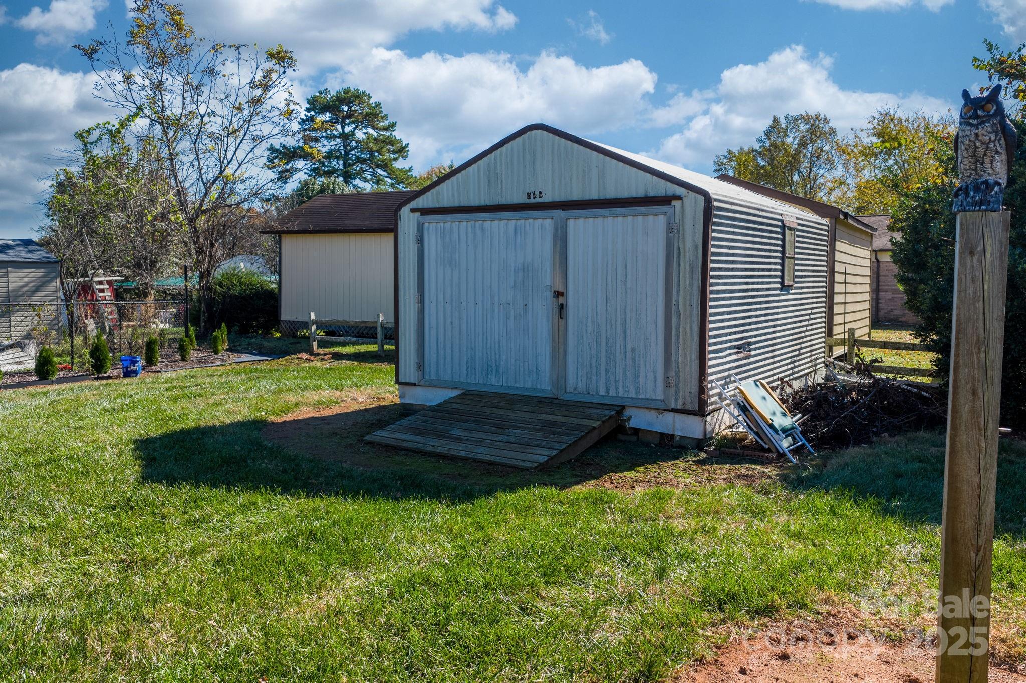 1515 Fairway Acres Road Lenoir, NC 28645 - Photo 33 of 35 a view of a house with backyard and garden