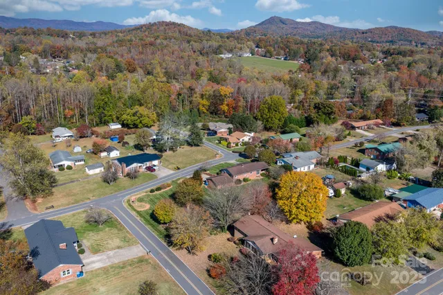 an aerial view of a house with a garden