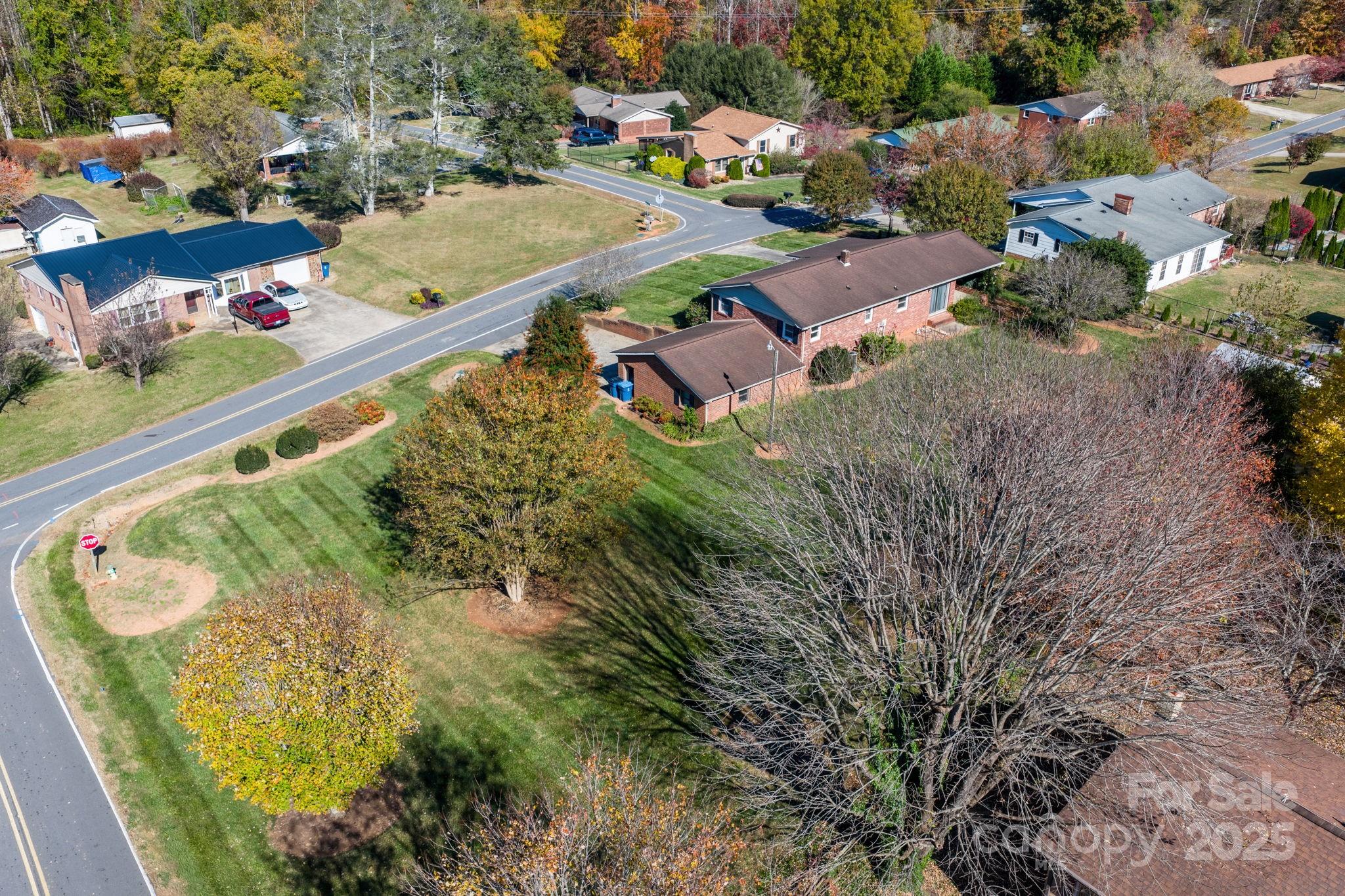 1515 Fairway Acres Road Lenoir, NC 28645 - Photo 35 of 35 an aerial view of a house with a garden