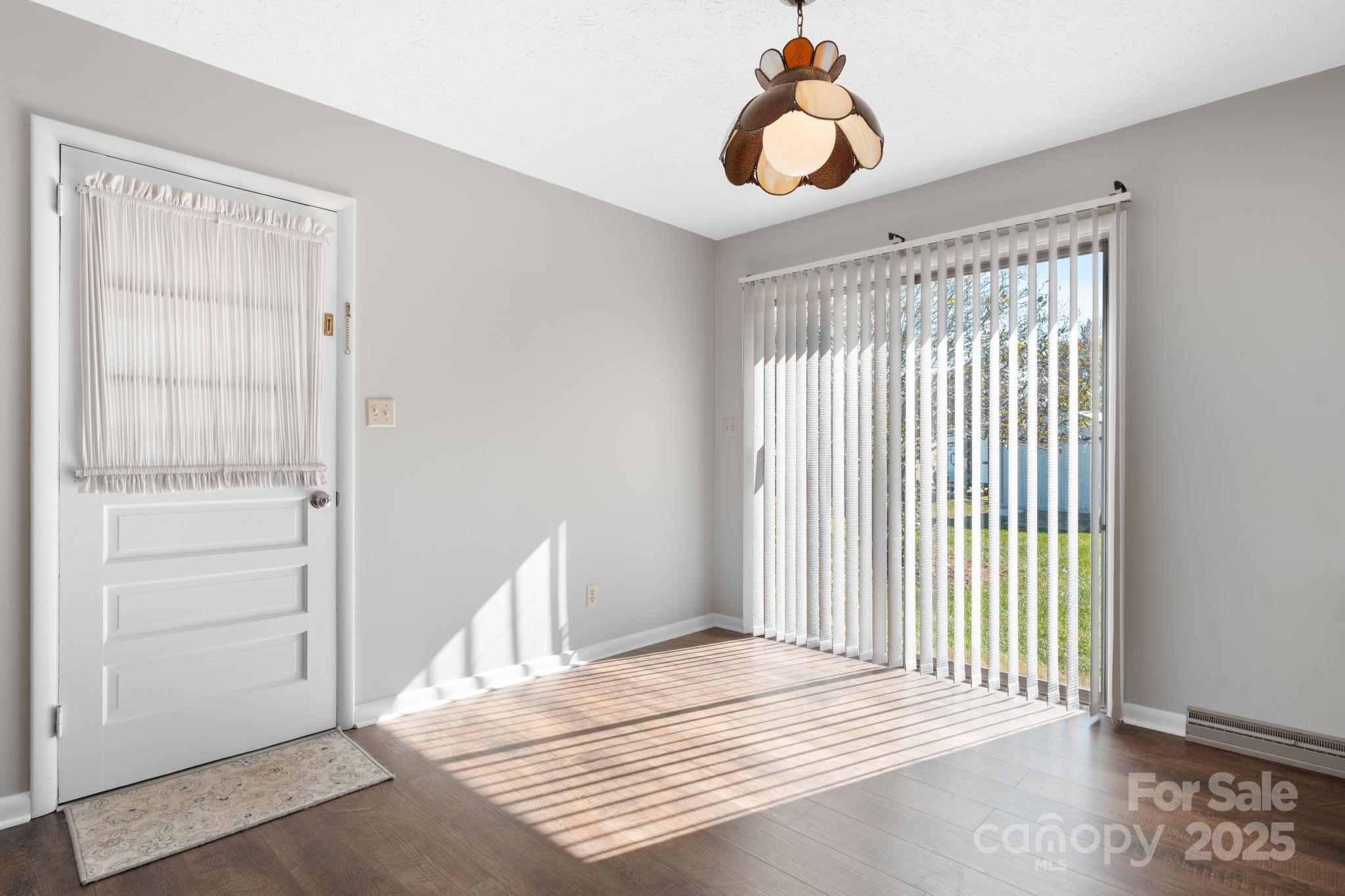 1515 Fairway Acres Road Lenoir, NC 28645 - Photo 8 of 35 a bedroom with a bed and a window