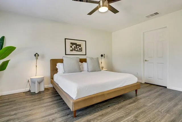 a patio with table and chairs