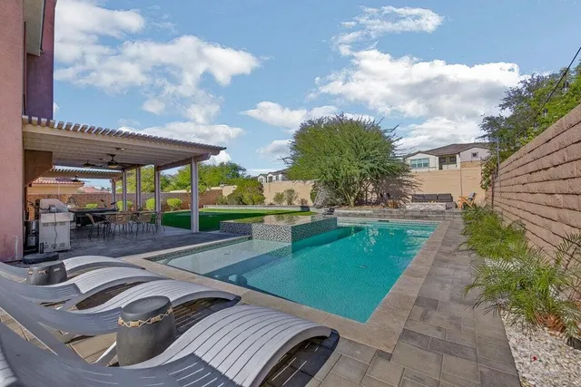 a view of a golf course with a lake