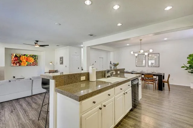 a view of entryway with wooden floor