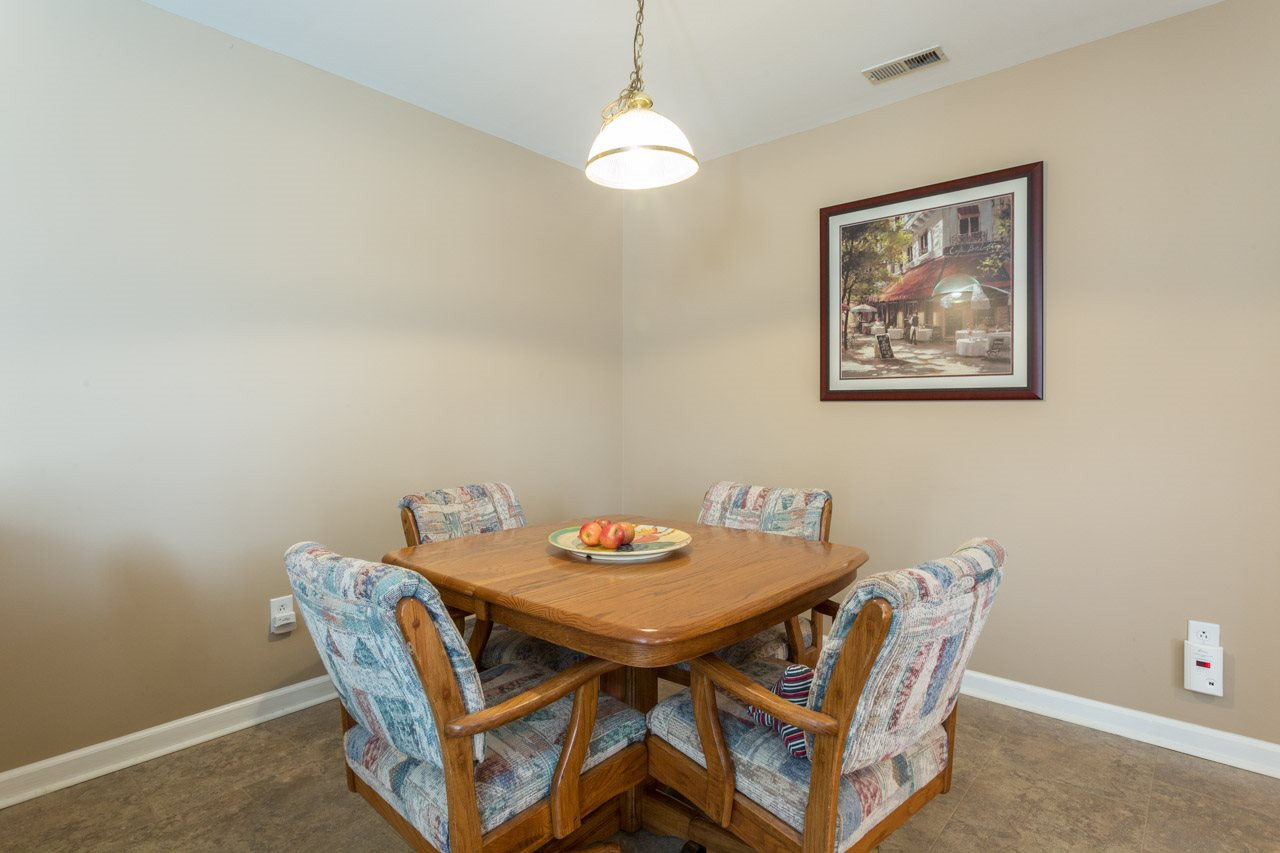 6705 Twin Tree Court Raleigh, NC 27613 - Photo 20 of 20 Open floor plan with dining area open to family room and kitchen. Dining Area