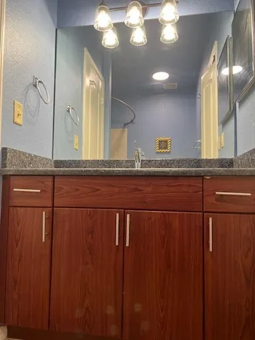 a bathroom with a toilet and a bathtub