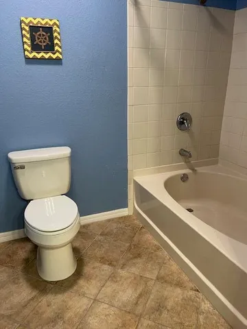 a view of room with window and hardwood floor