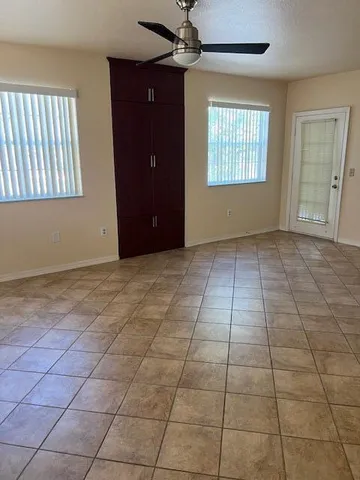 a view of an empty room and window