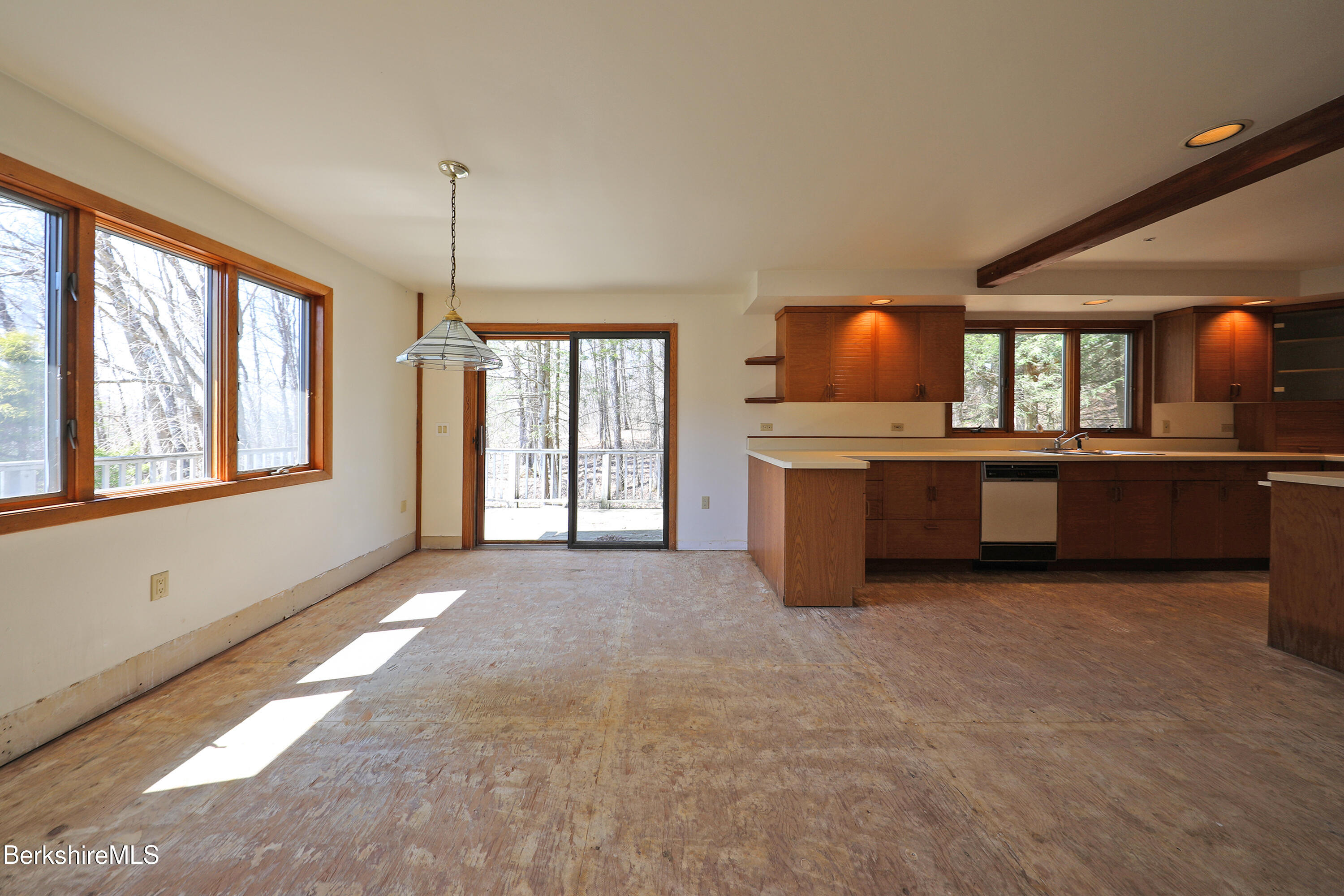 519 Kirchner Road Dalton, MA 01226 - Photo 19 of 42 a view of an empty room with a window and kitchen