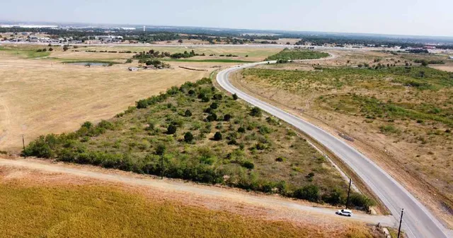 a view of a lake with a beach
