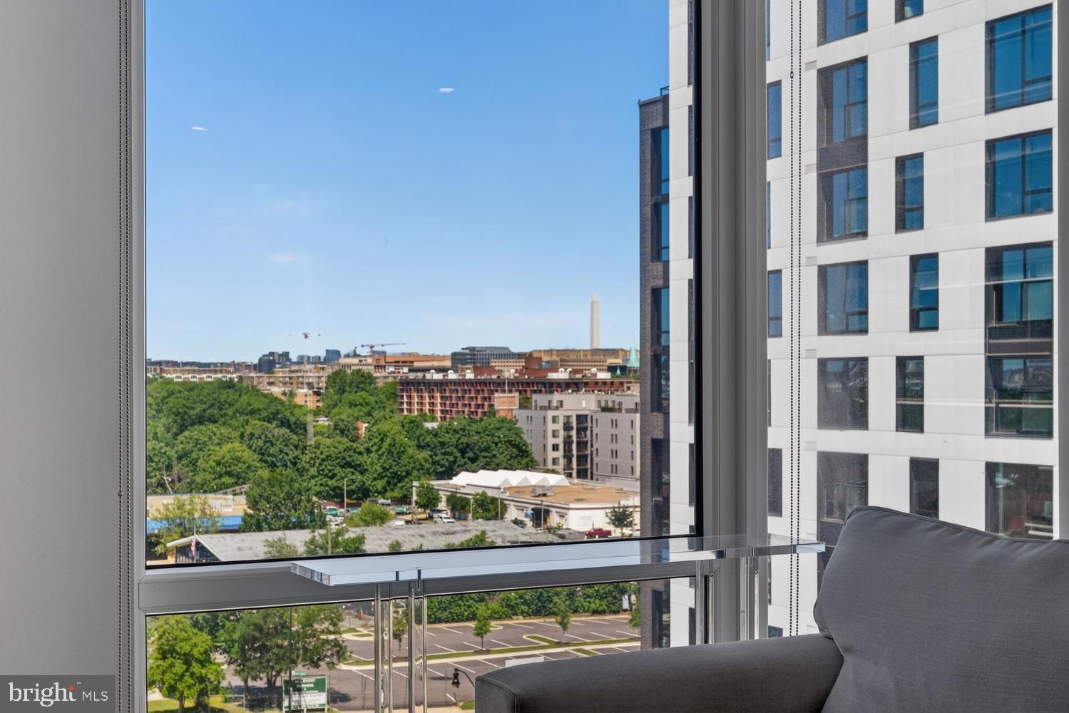 37 L Street Southeast, Unit 802 Washington, DC 20003 - Photo 6 of 23 a view of a balcony with couches