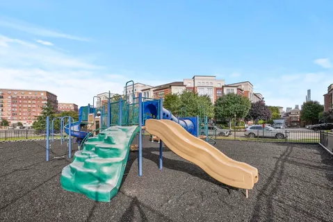 a view of a city with tall buildings