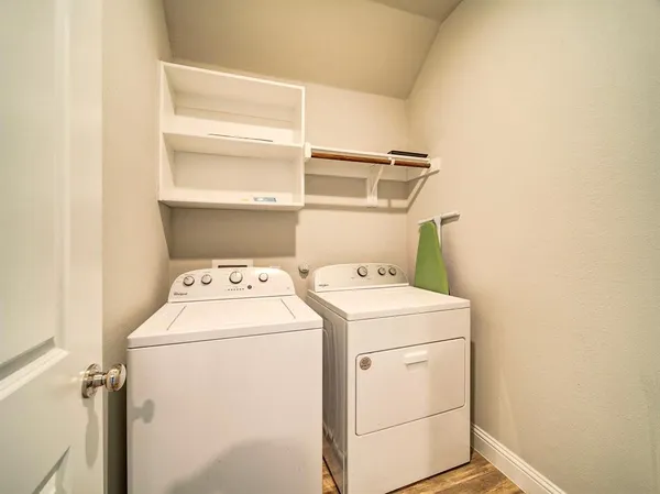 a utility room with dryer and washer