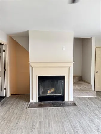 a living room with a fireplace