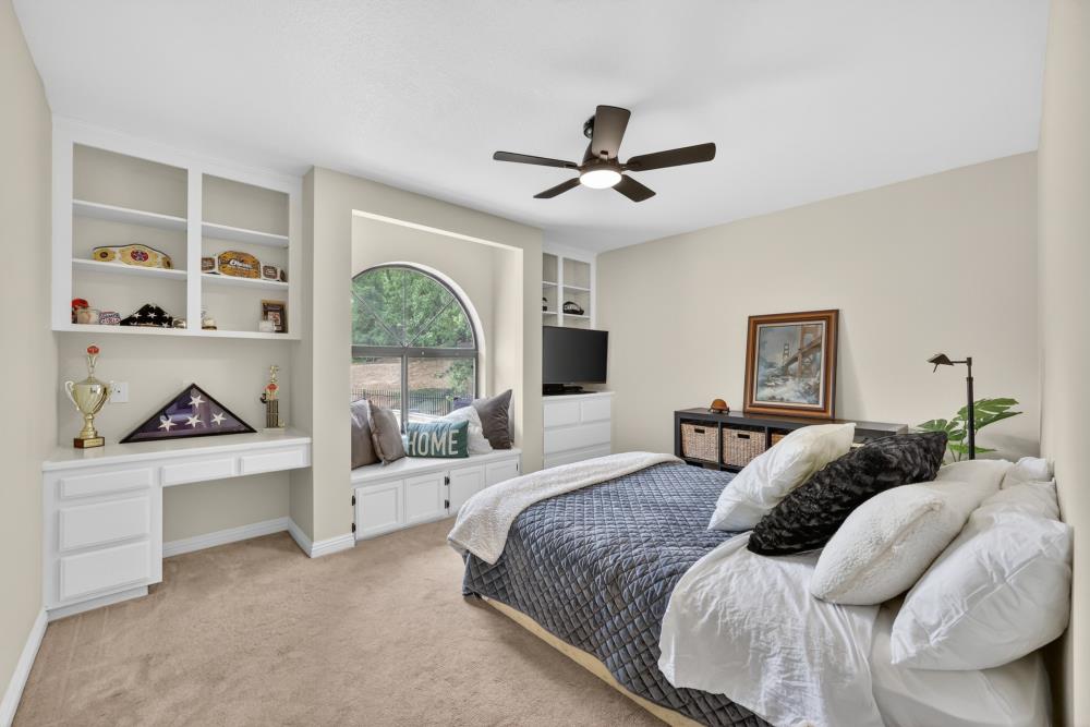3340 Garden Bar Road Lincoln, CA 95648 - Photo 27 of 56 a bedroom with a bed and a large window