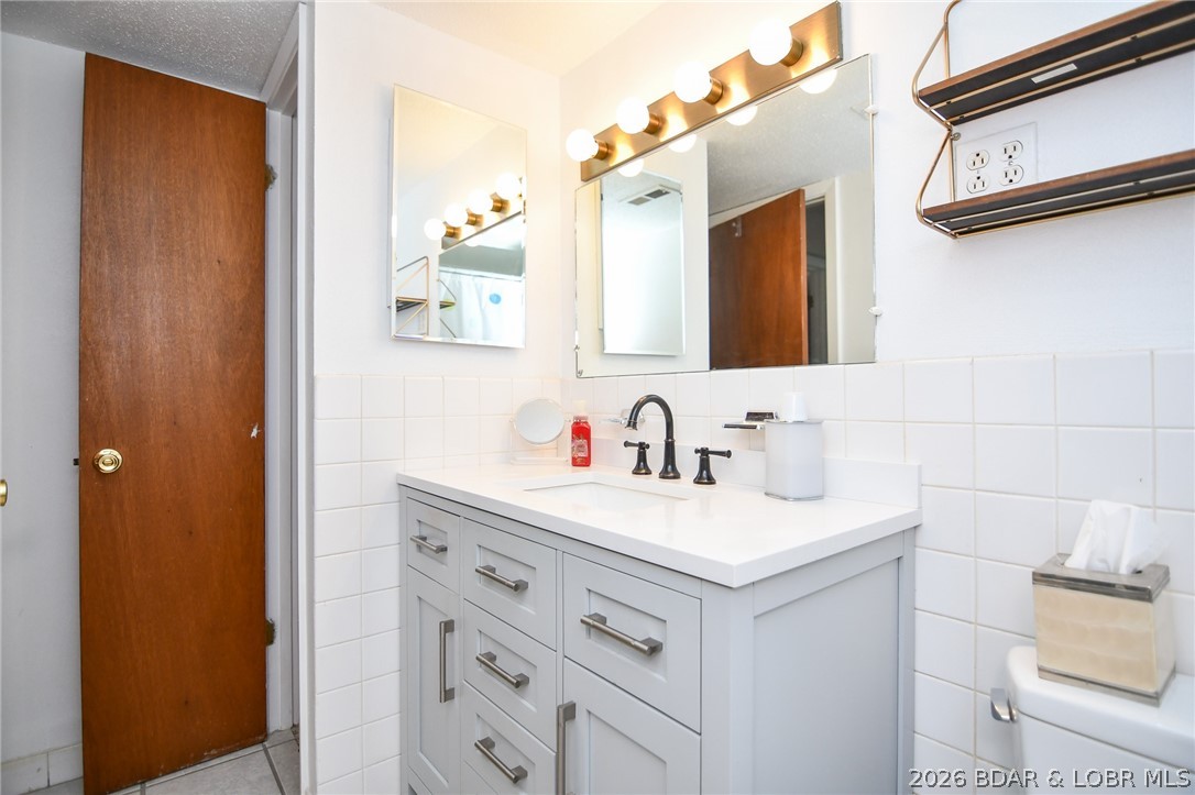 1118 Passover Road, Unit E216 Osage Beach, MO 65065 - Photo 18 of 31 Newer vanity