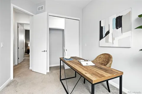 a room that has a table and a chair