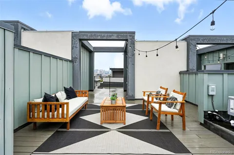 a outdoor space with patio furniture and a potted plant