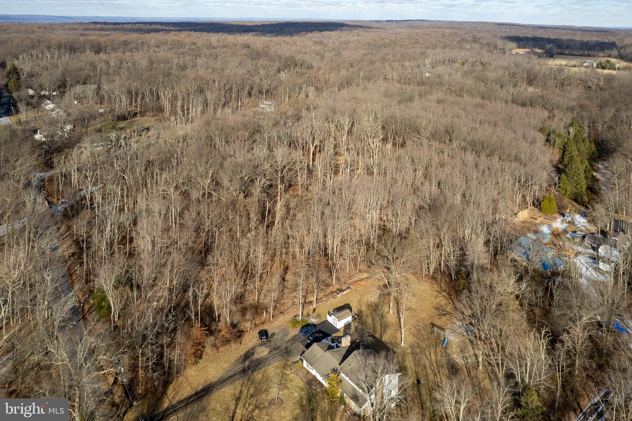 Lot 39 Stony Brook Road Hopewell, NJ 08525 - Photo 19 of 24 a view of a dry yard with wooden fence