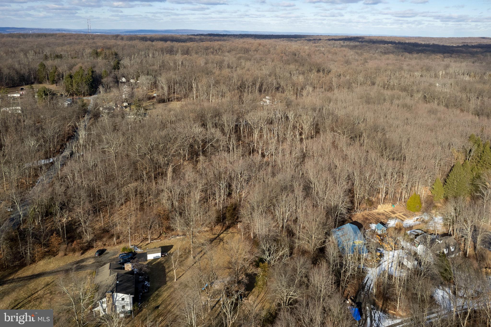 Lot 39 Stony Brook Road Hopewell, NJ 08525 - Photo 22 of 24 a view of a dry yard with wooden fence