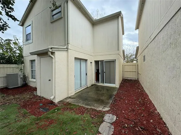 a view of a back yard of the house