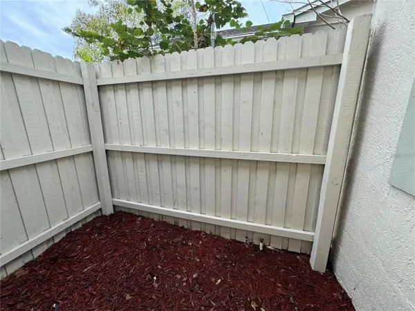 an empty room with a wooden door