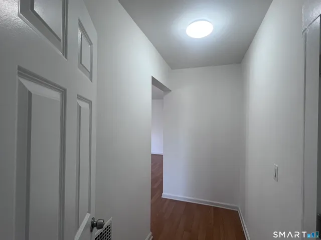 a view of hallway with stairs