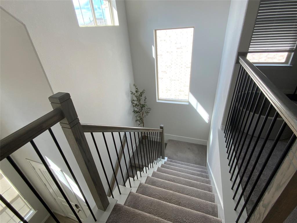 3318 Scotsman Road Sachse, TX 75048 - Photo 6 of 9 Staircase featuring baseboards