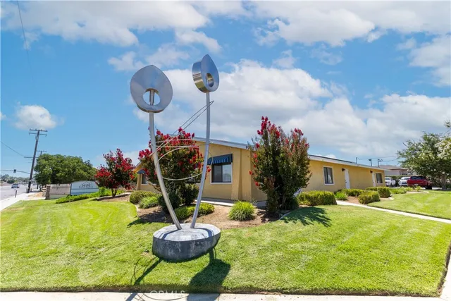 a view of a kitchen with kitchen appliances