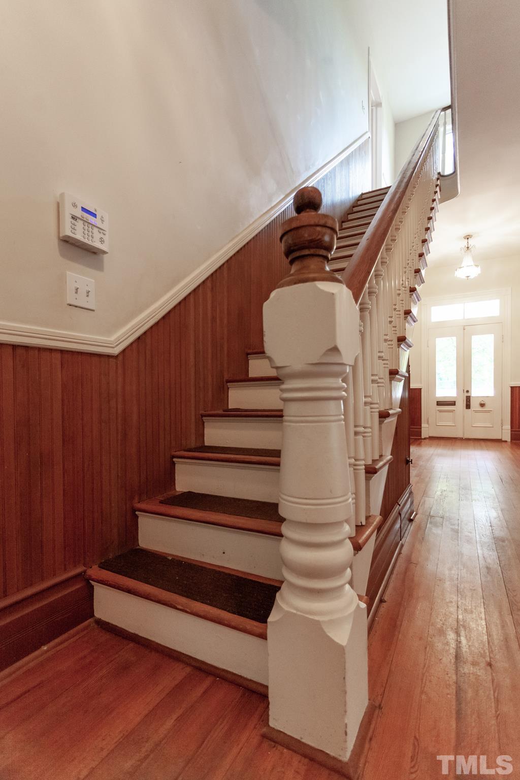323 East Lane Street Raleigh, NC 27601 - Photo 25 of 42 a view of entryway and hall with wooden floor