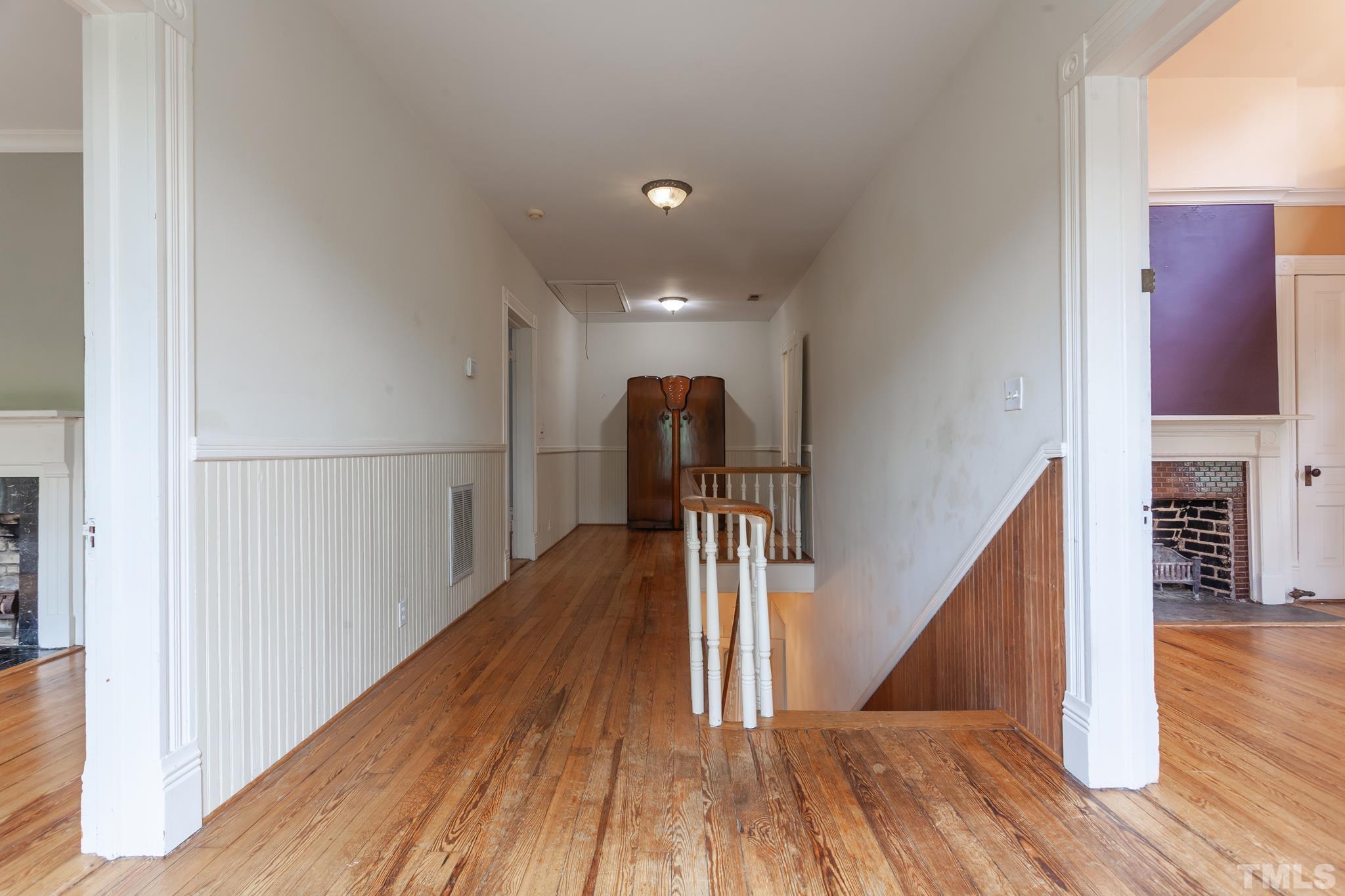 323 East Lane Street Raleigh, NC 27601 - Photo 26 of 42 a view of entryway and hall with wooden floor