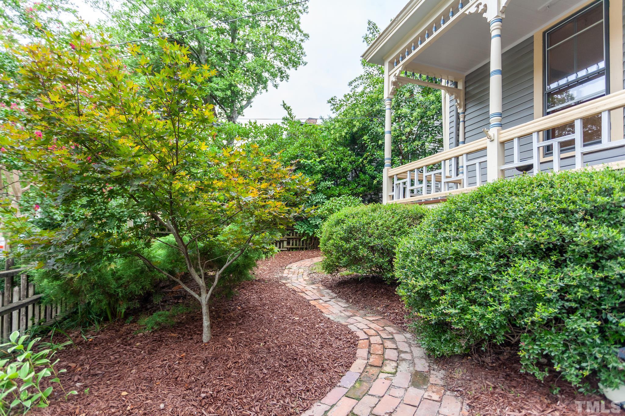 323 East Lane Street Raleigh, NC 27601 - Photo 36 of 42 a view of a pathway both side of house