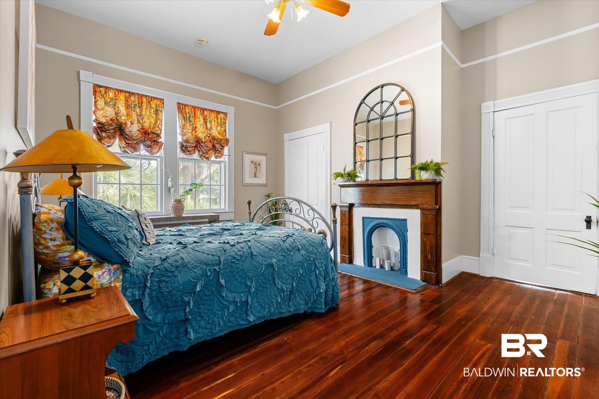 1210 Government Street Mobile, AL 36604 - Photo 20 of 37 Bedroom with ceiling fan and dark hardwood / wood-style floors