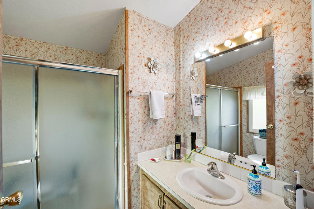 975 West Telegraph Road, Unit 10 Santa Paula, CA 93060 - Photo 12 of 21 a bathroom with a sink and a mirror