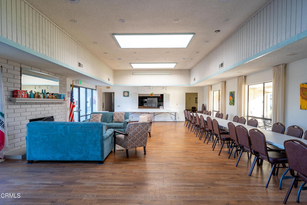 975 West Telegraph Road, Unit 10 Santa Paula, CA 93060 - Photo 21 of 21 a living room with furniture wooden floor and a window