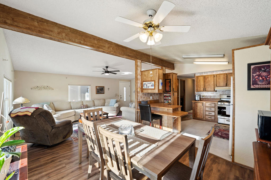 975 West Telegraph Road, Unit 10 Santa Paula, CA 93060 - Photo 6 of 21 a view of a dining room with furniture