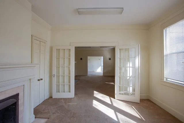 a view of a livingroom with a fireplace