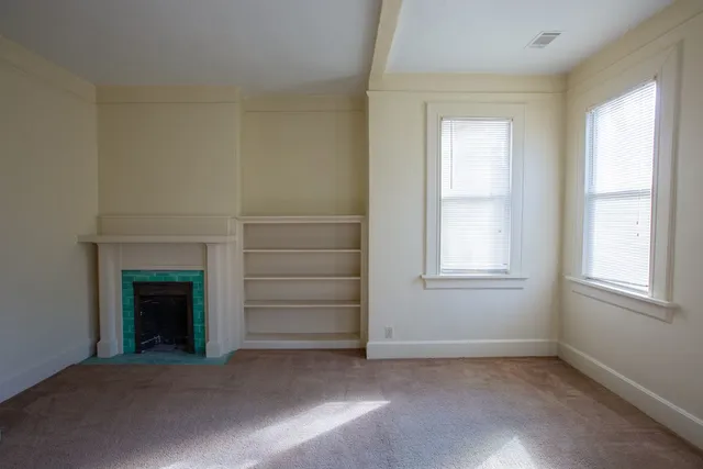 an empty room with windows