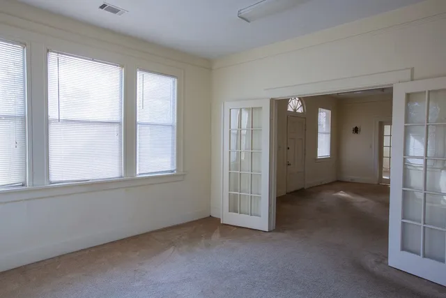an empty room with windows