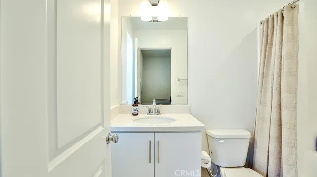 a close up of a utility room with dryer and washer