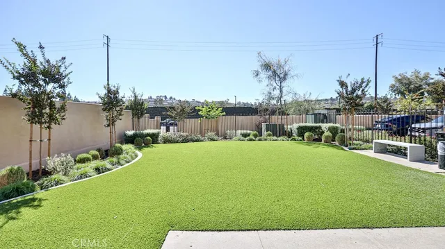 a view of a chairs and table in a patio