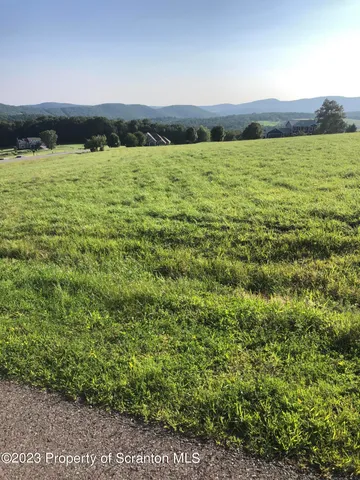 a view of lake and mountain