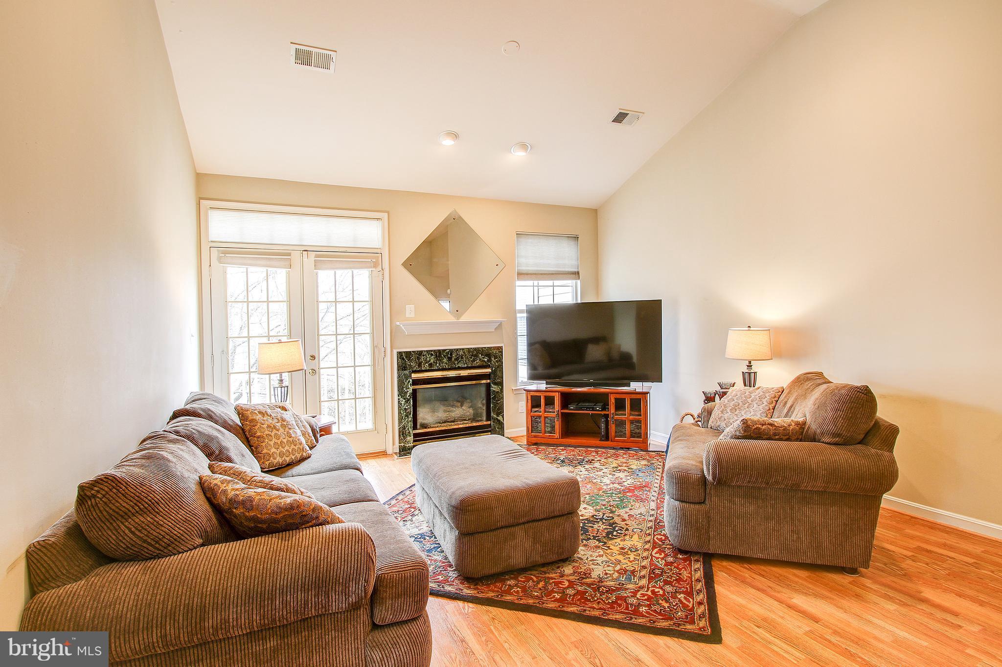 1305 Windleaf Drive, Unit 173 Reston, VA 20194 - Photo 8 of 30 Living Room