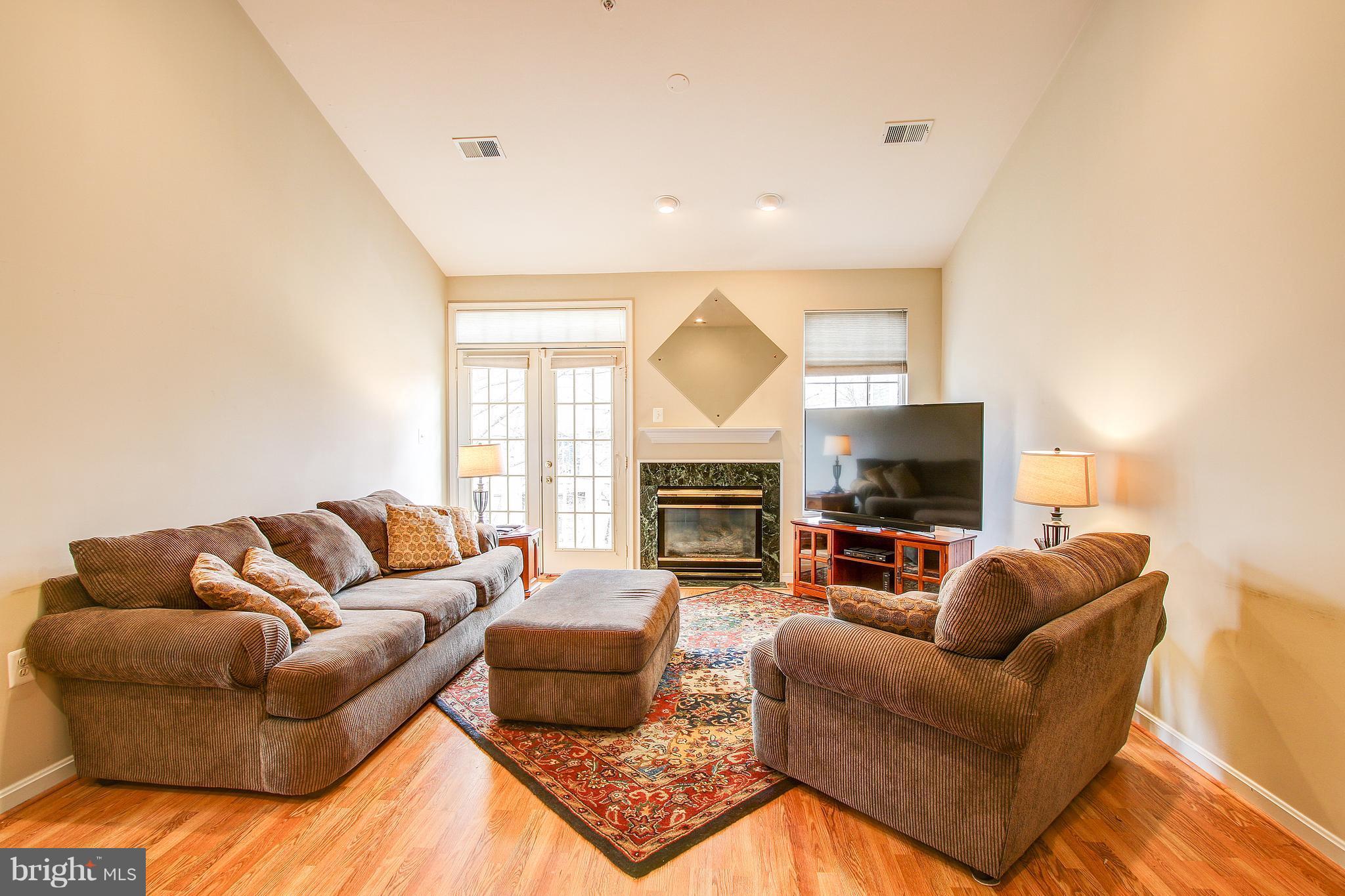 1305 Windleaf Drive, Unit 173 Reston, VA 20194 - Photo 9 of 30 Living Room
