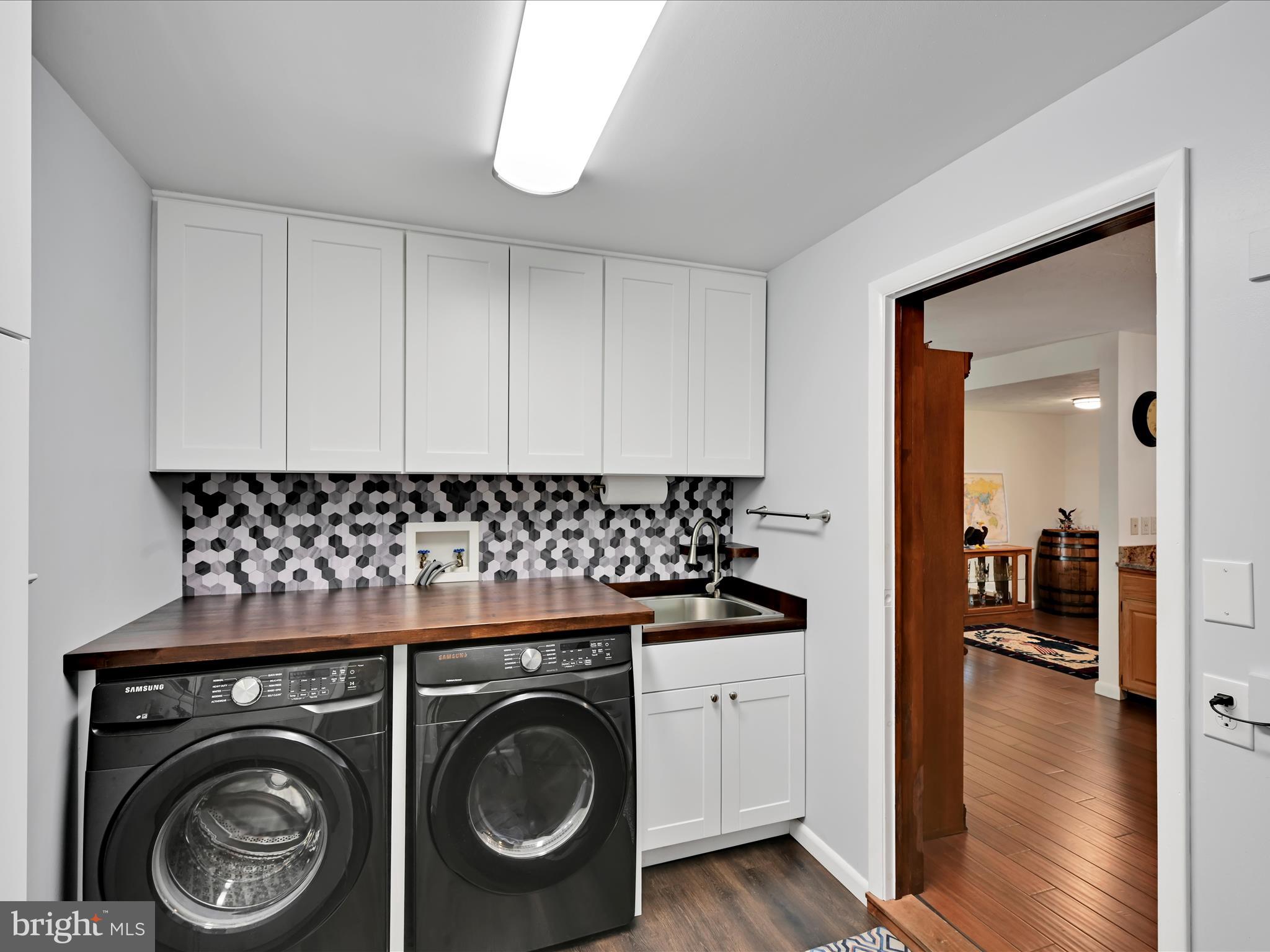 5150 Chestnut Grove Road Spring Grove, PA 17362 - Photo 15 of 56 a utility room with dryer and washer