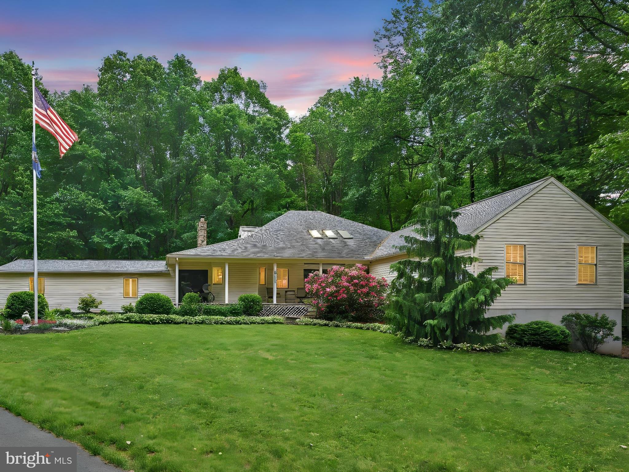 5150 Chestnut Grove Road Spring Grove, PA 17362 - Photo 2 of 56 a front view of a house with garden
