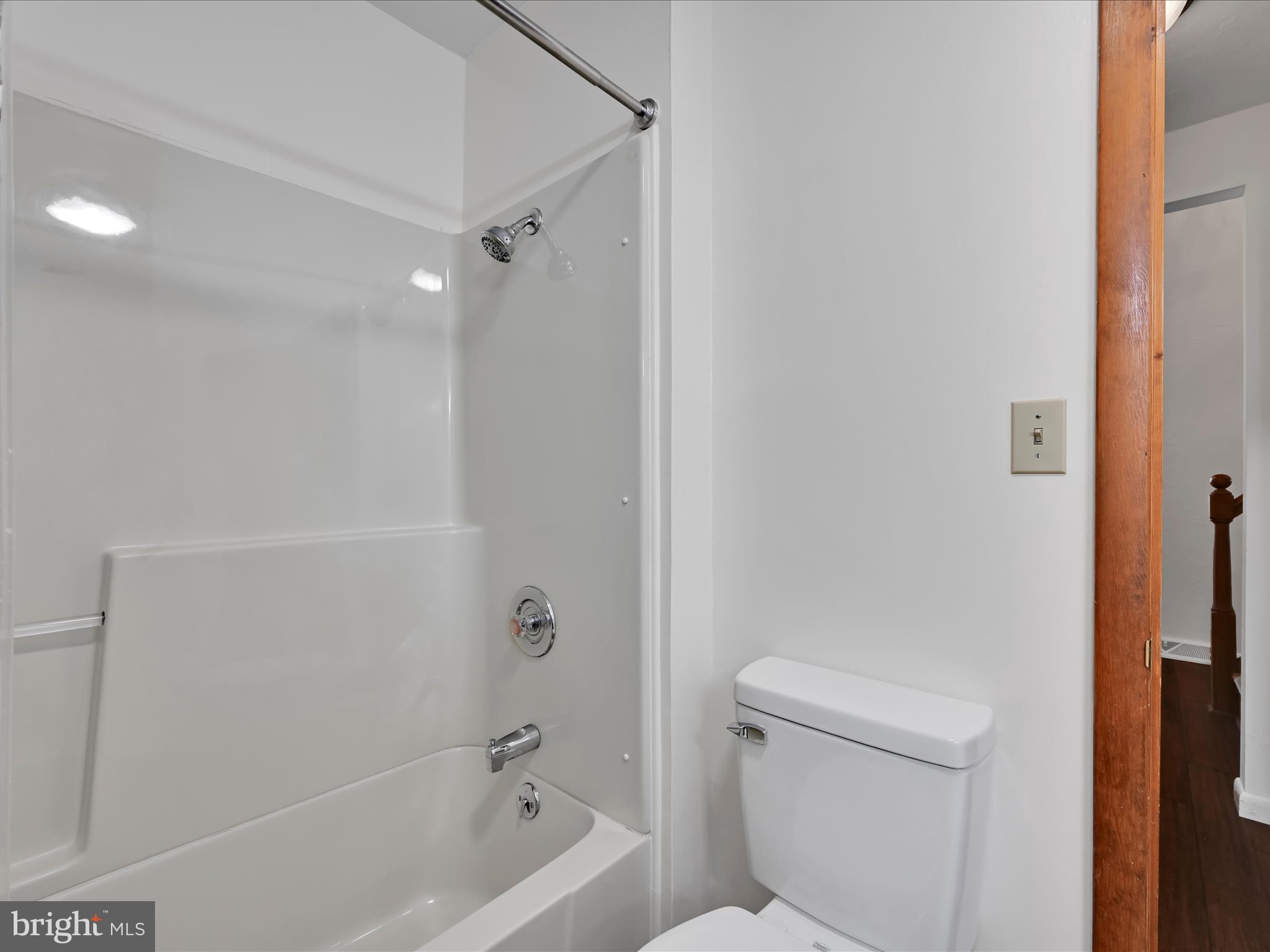 5150 Chestnut Grove Road Spring Grove, PA 17362 - Photo 29 of 56 a bathroom with a toilet and a bathtub