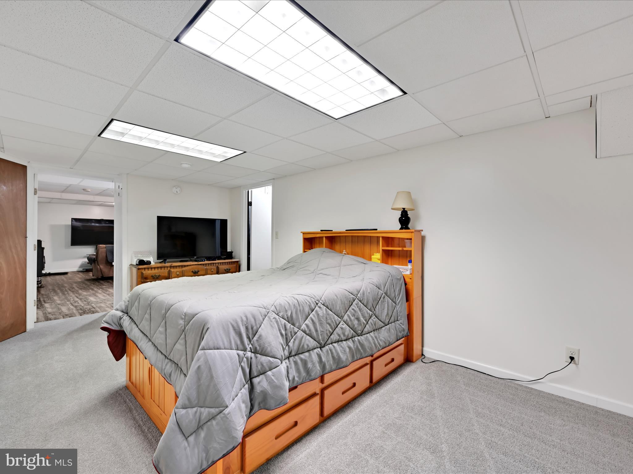 5150 Chestnut Grove Road Spring Grove, PA 17362 - Photo 39 of 56 a bedroom with a bed and a tv